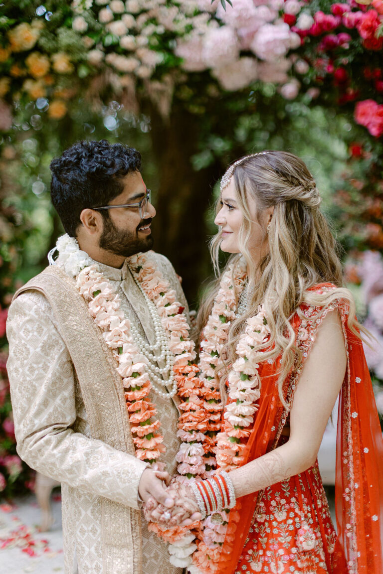 Couple in garlands at an Indian-American wedding, Dream Weddings Europe