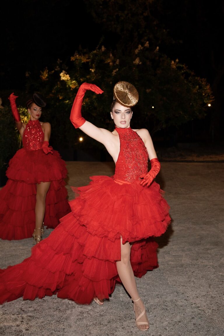 Evening entertainment in red against a night garden, Dream Weddings Europe