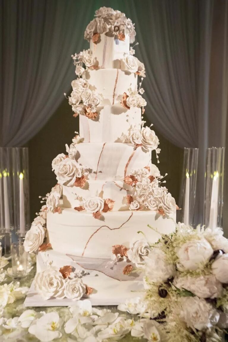 Tiered wedding cake with floral decoration, Montage Laguna Beach, Duke Photography