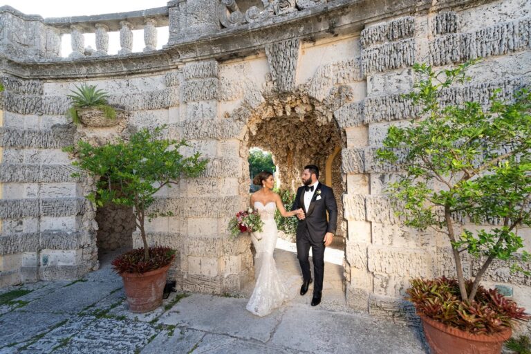 Couple in a stone grotto archway, Vizcaya Museum and Gardens, Miami, Duke Photography