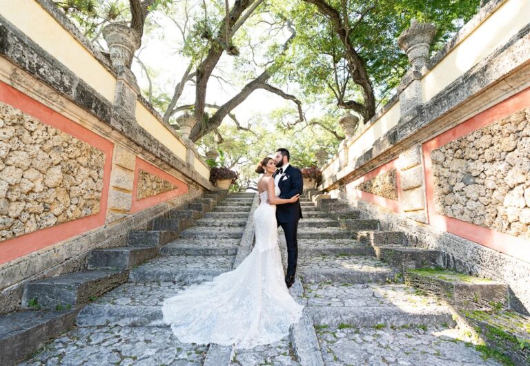 Couple on the stone steps beneath old oaks, Vizcaya Museum and Gardens, Miami, Duke Photography