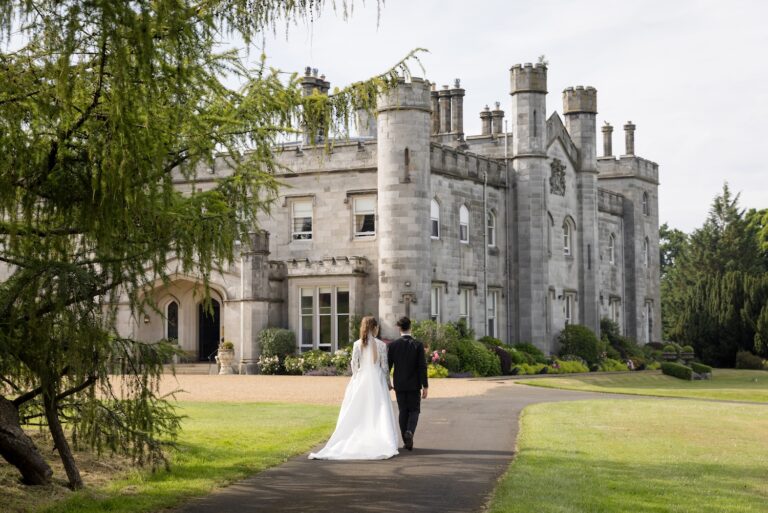 A couple walking up the drive towards the castle front, Dundas Castle