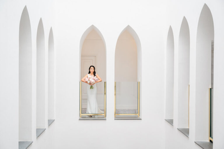 The bride in a white arcade of pointed arches, Amalfi Coast, Elisa Prati Wedding Italy