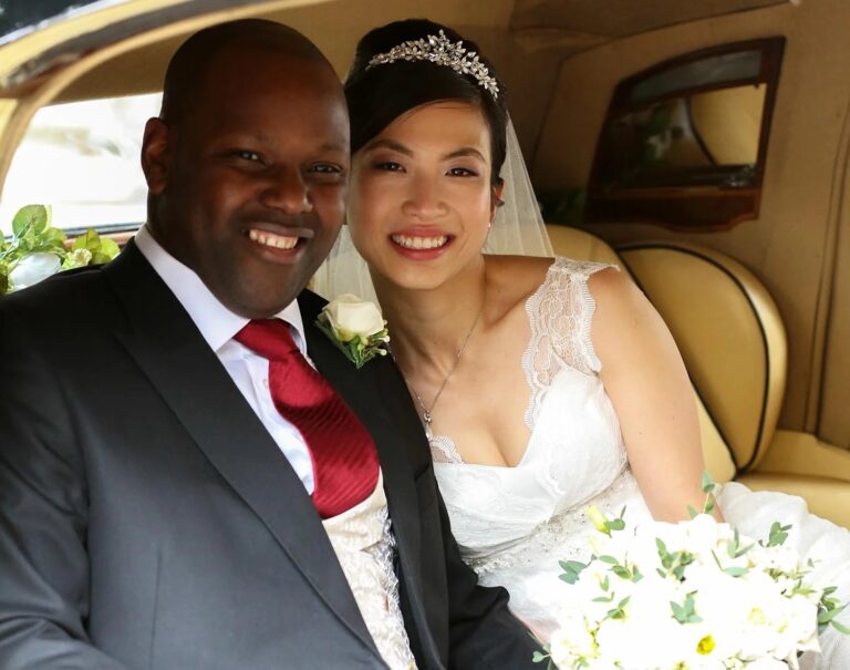 A bride and groom together in the wedding car, Four Seasons Park Lane, Elizabeth Hsieh Make Up Artist