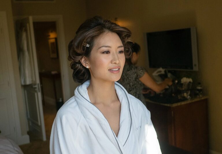 A bride in a white robe with curlers in, getting ready, The Berkeley, Elizabeth Hsieh Make Up Artist