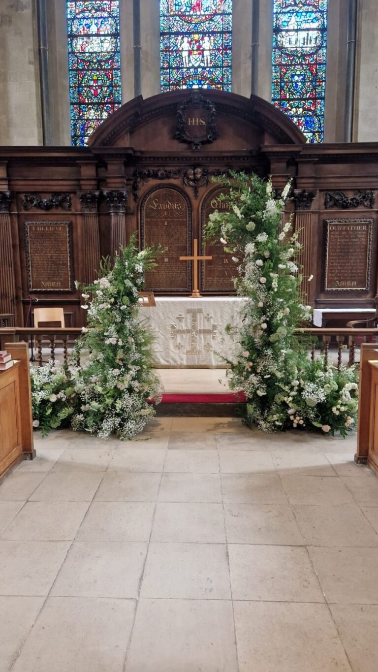 A floral arch flanking the altar, The Temple Church, Elizabeth Marsh Floral Design