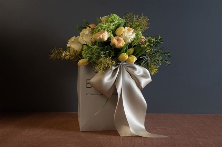 A gift-wrapped bouquet in EMFD's own branded packaging, Elizabeth Marsh Floral Design