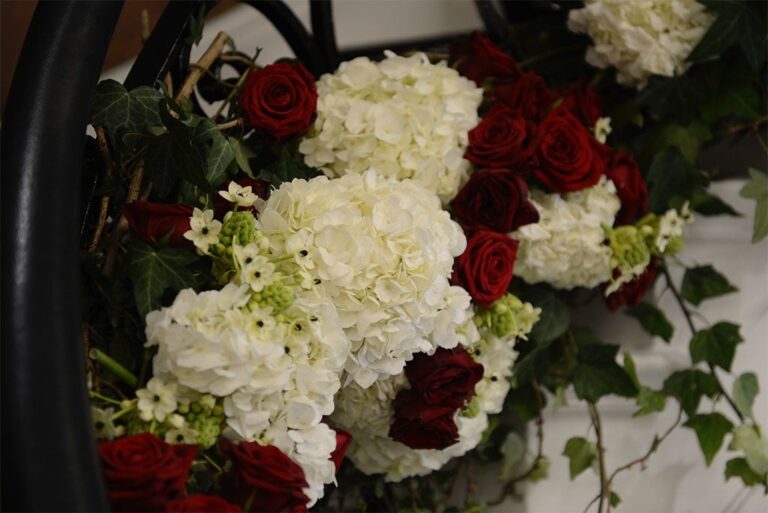 A wreath of white hydrangea and red roses, Elizabeth Marsh Floral Design