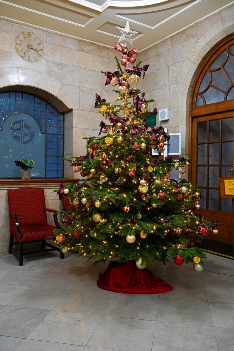 The Christmas tree installation in the entrance hall at Church House, Westminster, Elizabeth Marsh Floral Design