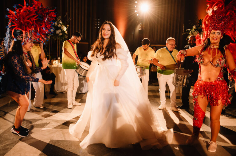 Samba dancers and musicians with the bride at a Painted Hall wedding in Greenwich, Emma-Jane Photography