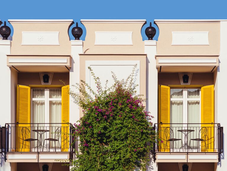 The facade in bougainvillea, with its blue lanterns, Esplanade Boutique Hotel