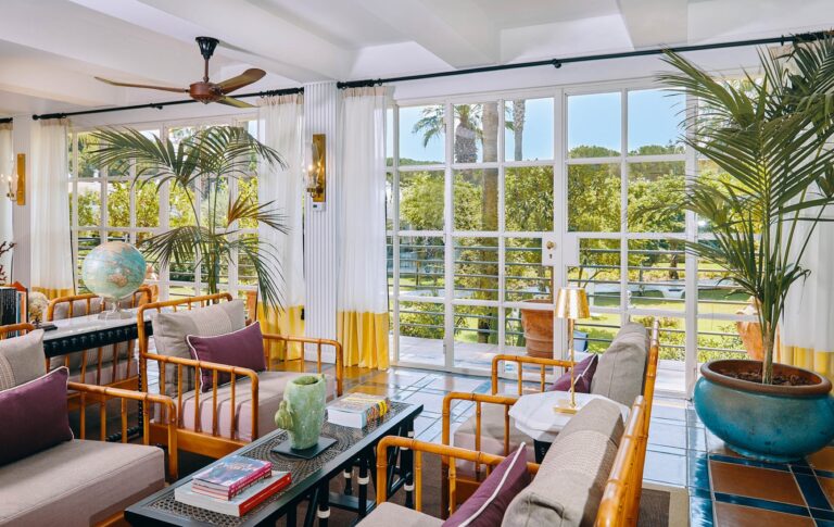 A bright sitting room, opening to the garden, Esplanade Boutique Hotel