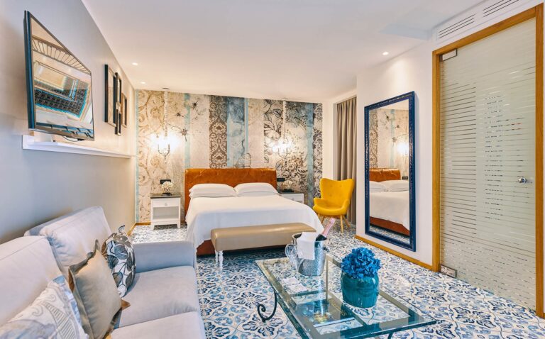A junior suite, with its own sitting area, Esplanade Boutique Hotel
