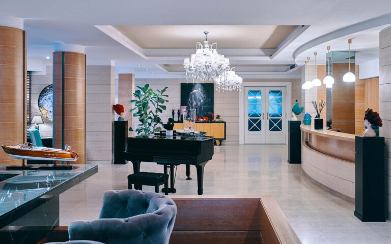 The lobby bar, beneath a chandelier, Esplanade Boutique Hotel