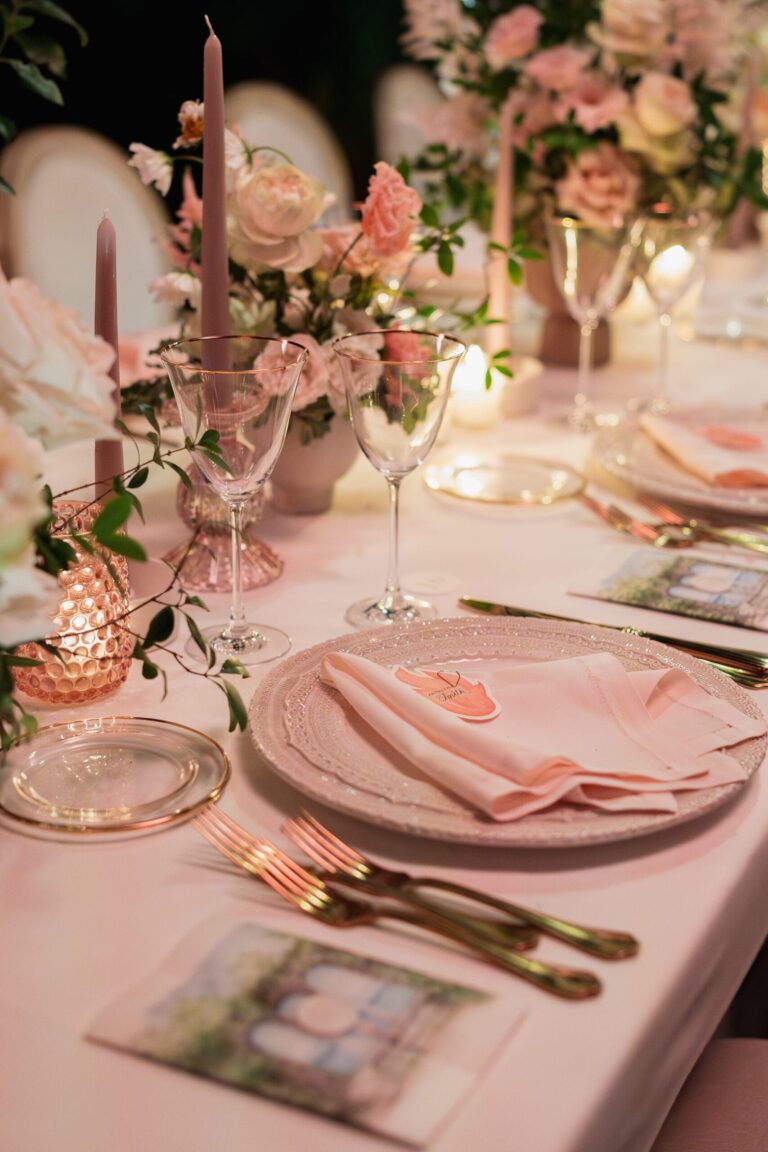 A place setting in blush: pink tapers, garden roses, gold cutlery, Ester Chianelli Weddings & Events