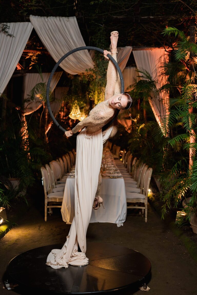 An aerialist in a hoop above the dance floor, Ester Chianelli Weddings & Events
