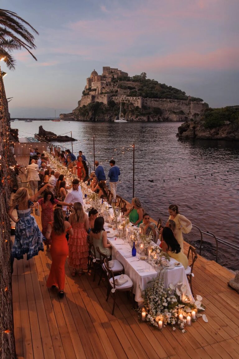 The same deck at sunset, dinner served, the castle in silhouette, Ester Chianelli Weddings & Events