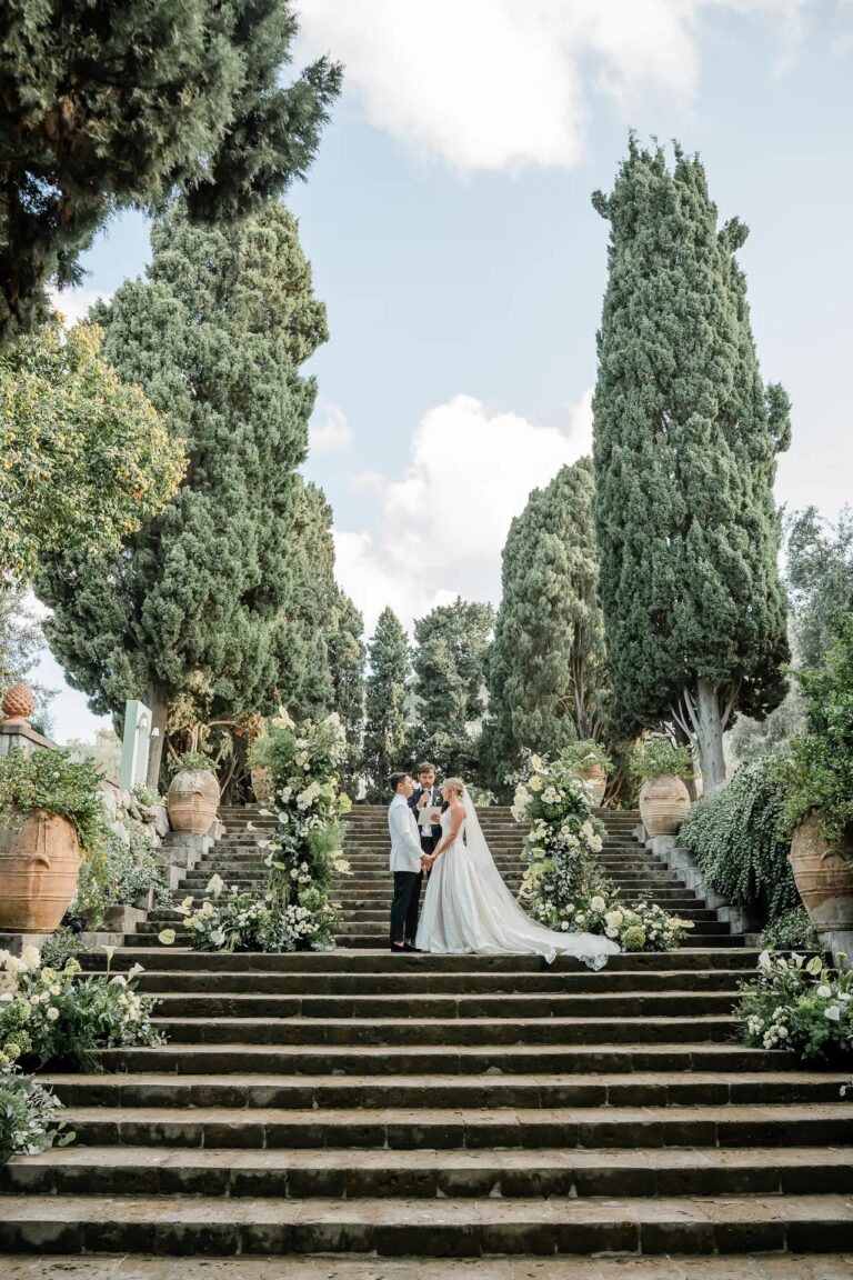 The couple on the stone staircase between two cypresses, Ester Chianelli Weddings & Events