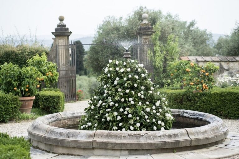 A white rose topiary, an Italian garden fountain, Farima Perry Florals and Events