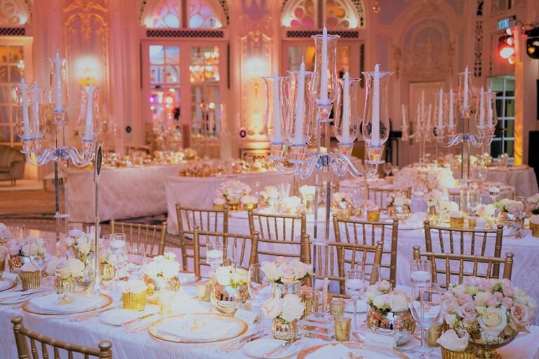 A candelabra dinner, lit in pink, Farima Perry Florals and Events