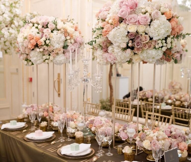Tall centrepieces of pink and peach roses, Farima Perry Florals and Events