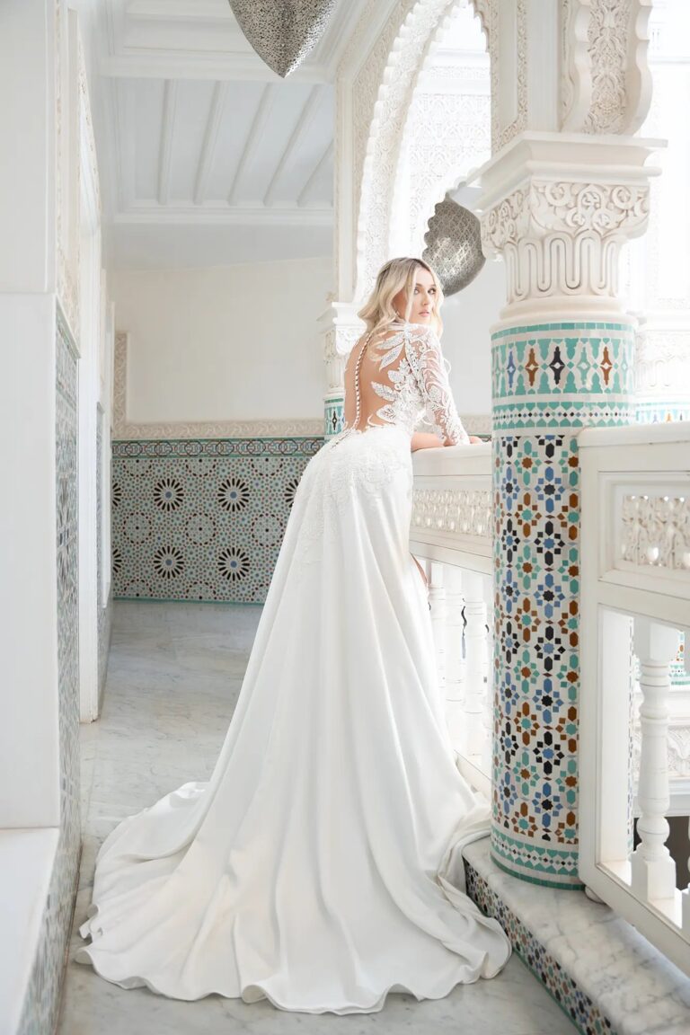 Ferdinand Atelier couture: a white satin gown on a tiled Moroccan staircase