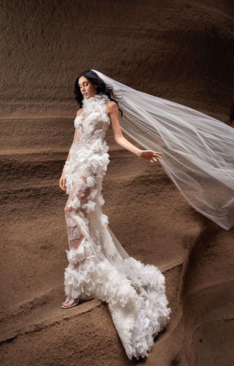 Ferdinand Atelier couture: a lace gown and long veil in a sandstone canyon