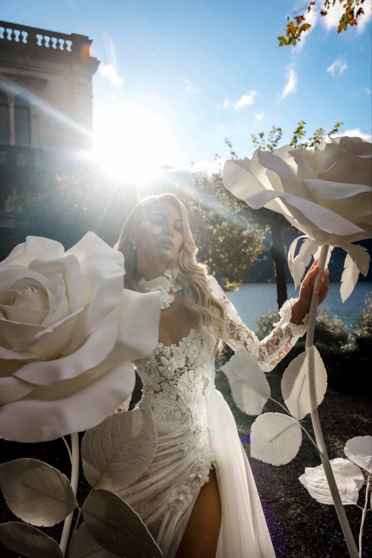 Ferdinand Atelier couture: a lace gown among oversized paper roses