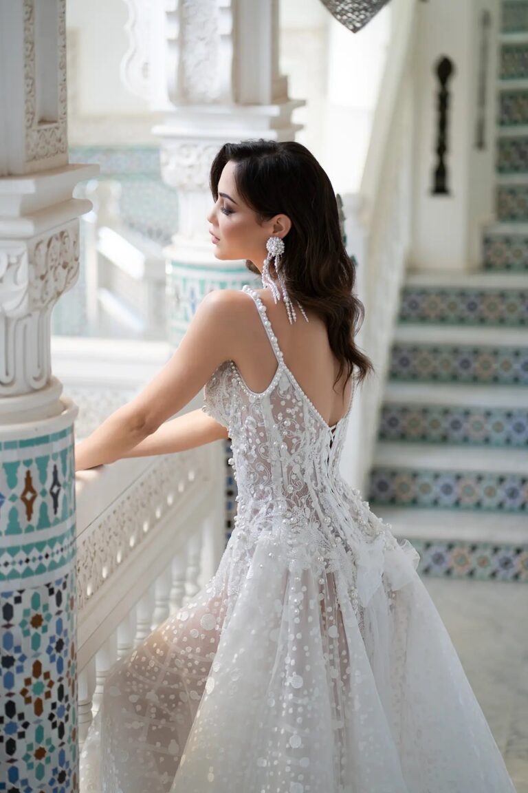 Ferdinand Atelier couture: a lace gown on a tiled balcony