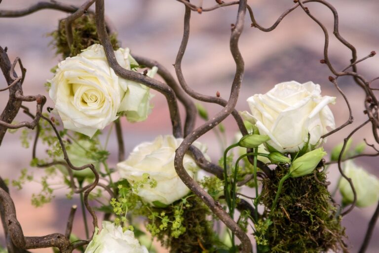 White roses and lisianthus among curled hazel branches, Fiori Amore Fantasia