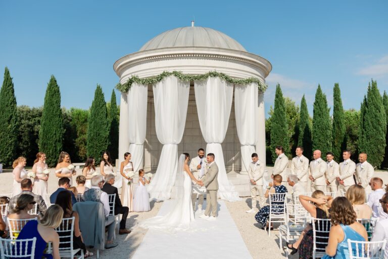 A ceremony beneath a draped white pavilion among cypress trees, Istria, Flammeum