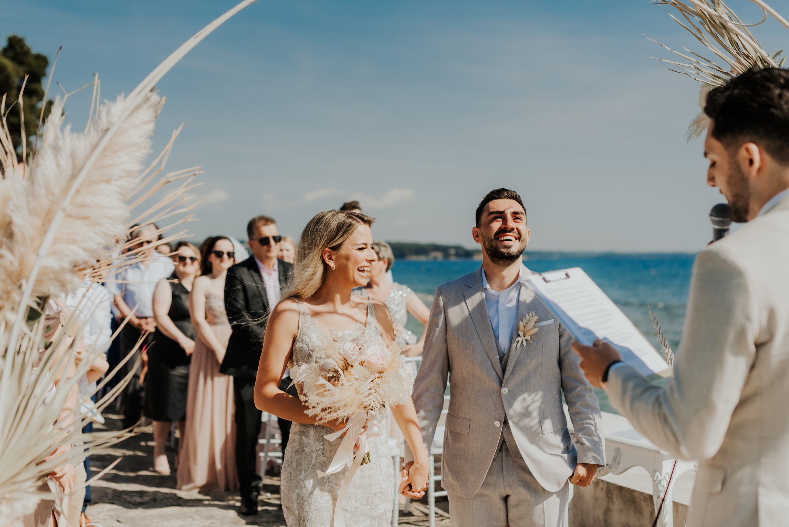 Vows with pampas grass styling and the sea behind, Istria, Flammeum