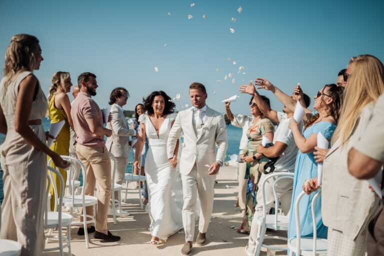 Petals thrown as the couple walk the aisle by the sea, Istria, Flammeum