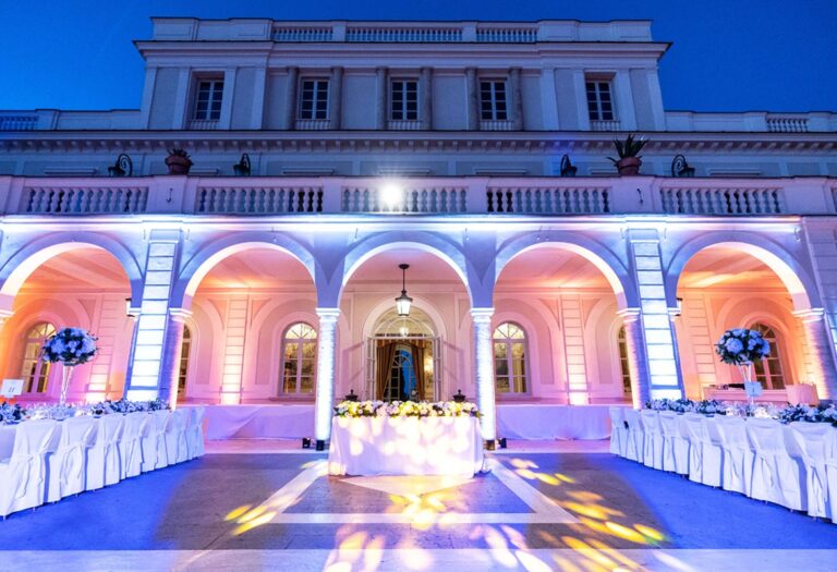Villa Miani at blue hour, the colonnade lit for the evening, Flavia Bruni