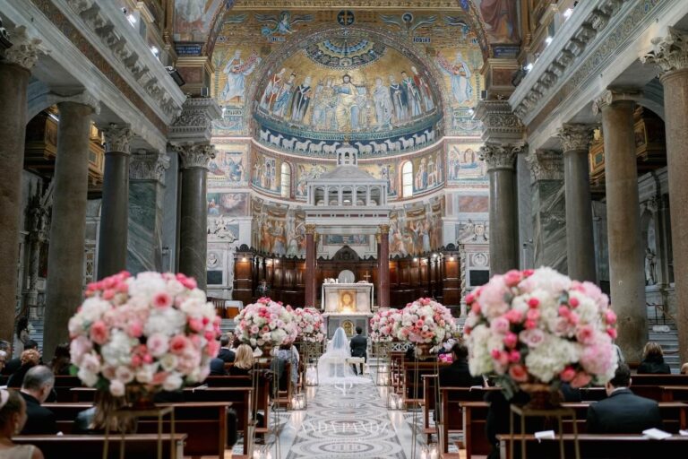 Floral pedestals line the aisle, Basilica di Santa Maria in Trastevere, Floreventi