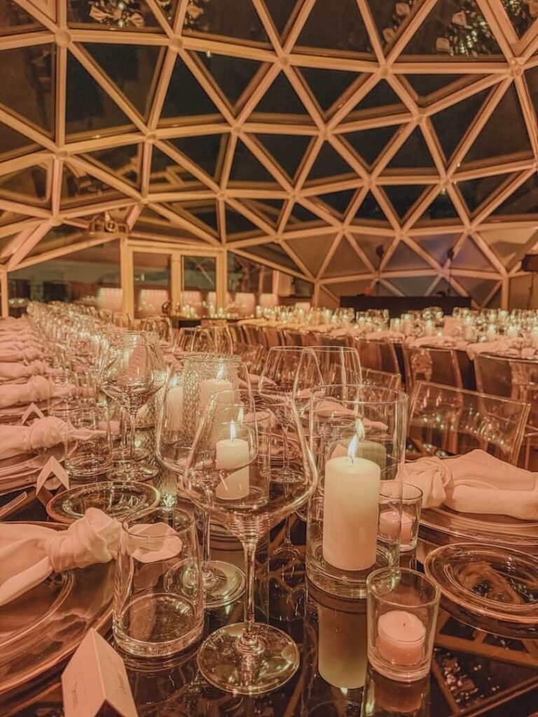 A candlelit table inside La Lanterna di Fuksas, Floreventi