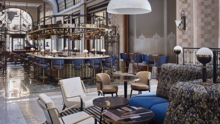 Lounge area of MÚZSA with blue banquettes, Four Seasons Hotel Gresham Palace