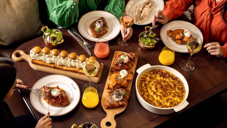 Brunch dishes shared at the table, Four Seasons Hotel Gresham Palace