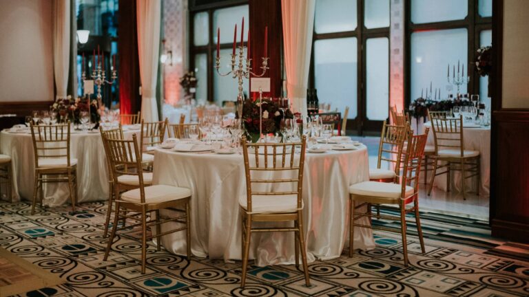 Round banquet tables laid for a wedding reception, Four Seasons Hotel Gresham Palace