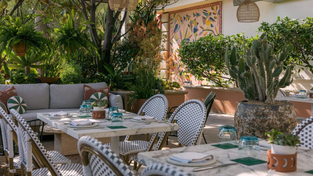 La Ola poolside terrace tables among succulents, Four Seasons Los Angeles at Beverly Hills