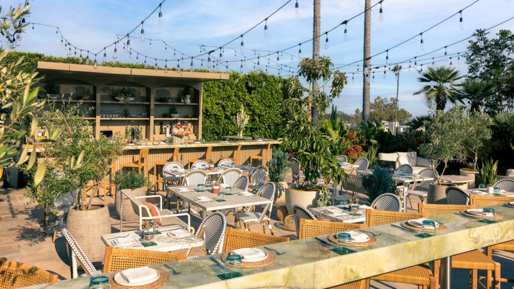 Terrace bar with string lights, Four Seasons Los Angeles at Beverly Hills