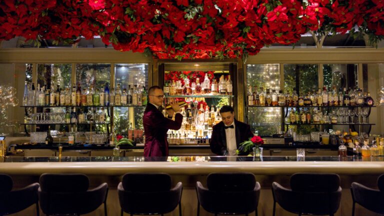 The bar with red floral installation, Four Seasons Los Angeles at Beverly Hills