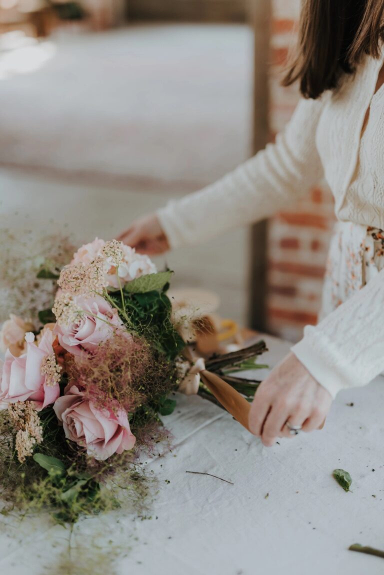 Nicola composing a bouquet at the studio, Foxgloves and Roses