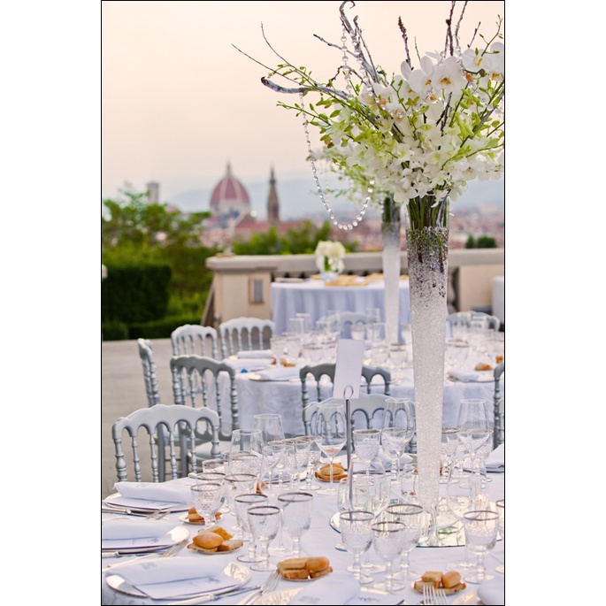A tall candlelit centerpiece on the rooftop terrace, the Duomo beyond, Villa la Vedetta, Franci's Flowers Wedding Design