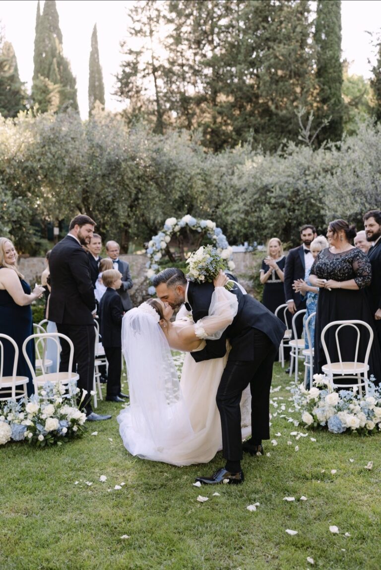 Jaclyn and Alexander embrace beneath fairy lights, Villa Merlo Nero, Franci's Flowers Wedding Design