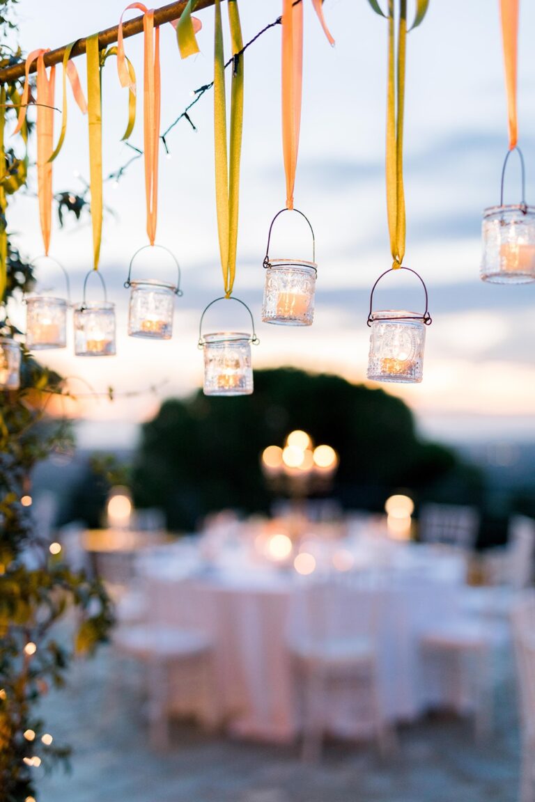 Hanging lanterns and warm garden light over the reception, Castello di Segalari, Franci's Flowers Wedding Design