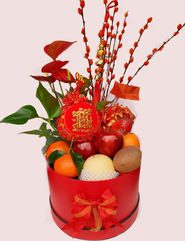 Fresh fruit and flower arrangement in a red hat box, Fruity Gift