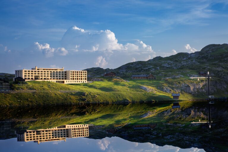 The resort reflected in the lake, Frutt Mountain Resort