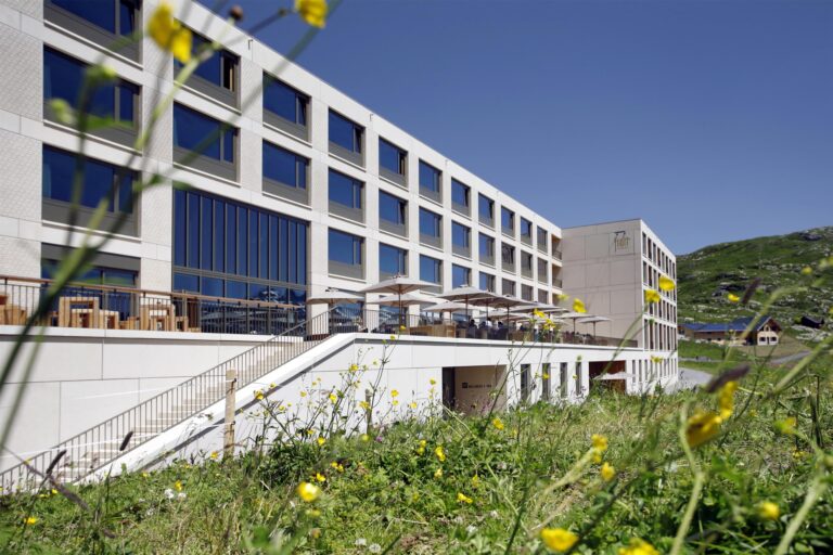 The resort facade and terrace in summer, Frutt Mountain Resort