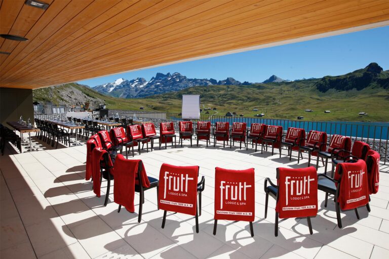Terrace seating with the mountains beyond, Frutt Mountain Resort